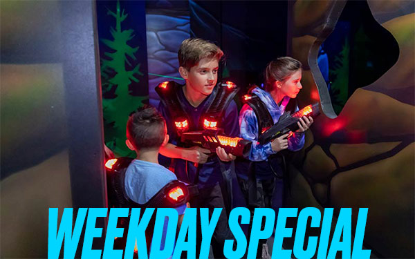 Two kids play laser tag at Arena Sports Issaquah