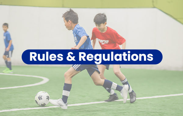 Boys play soccer during Indoor Youth League game at Arena Sports