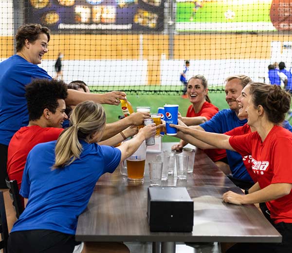 Adult league players eat and drink in the restaurant at Arena Sports