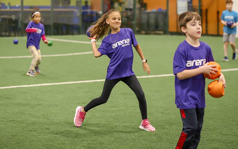 Kids have fun playing field games at School's Out Camp at Arena Sports